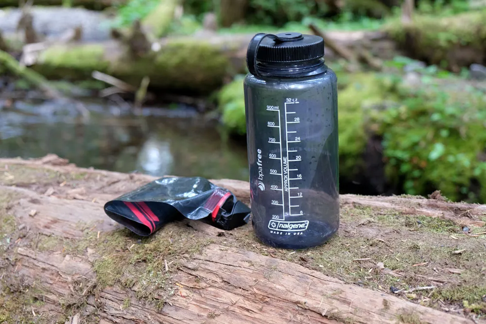 Different types of hiking water bottles and hydration systems
